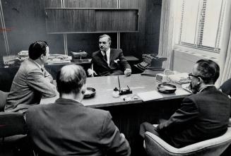 An Earnest Premier Robarts faces the star panel at recording session