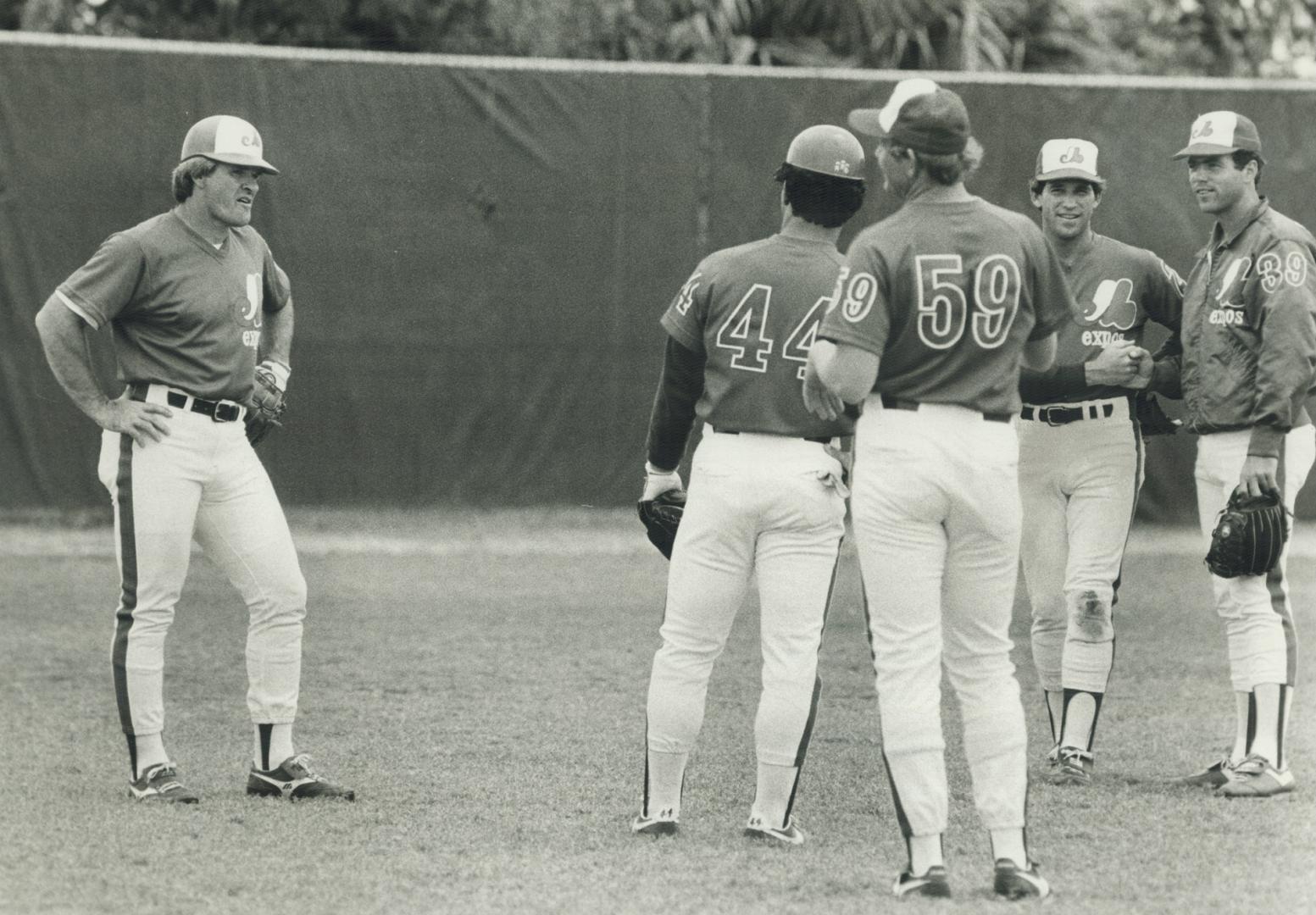 Odd man out: Veteran Pete Rose, who appears to be the odd man out during this practice session, is the man the Expos will be counting on to inject new optimism into the club