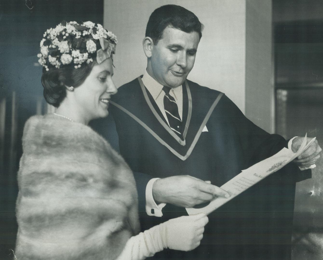 Mr. and Mrs. W. P. Ross at graduation. He found studying law just a difficult sideline