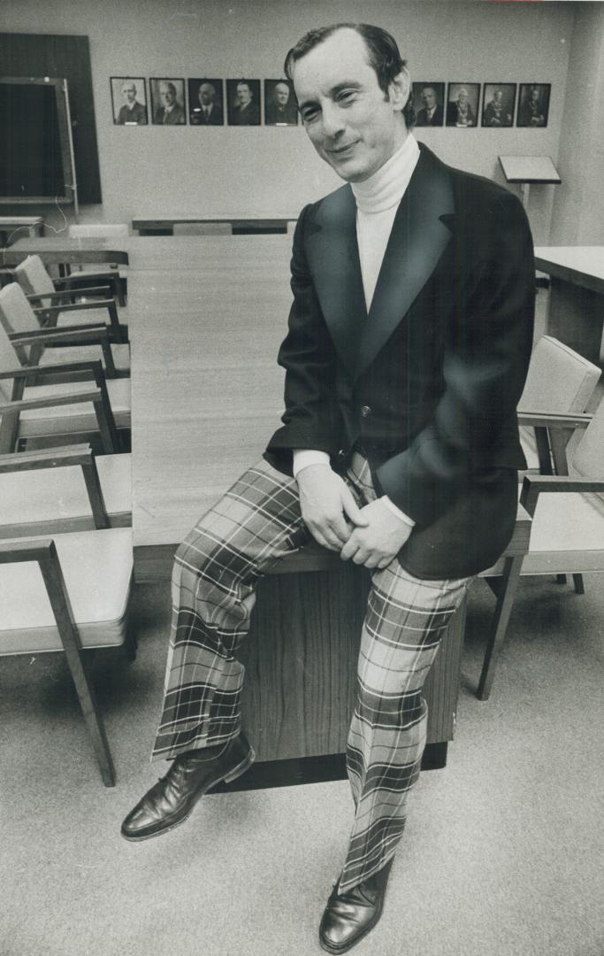 Alderman David Rotenberg, another candidate running for mayor, models navy wool single-breasted blazer, white cotton lisle turtleneck and plaid cuffed(...)