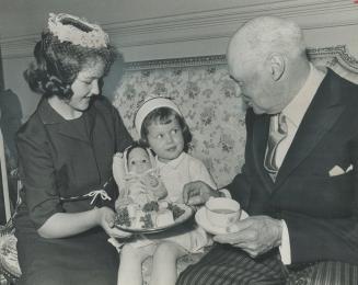 Lt.-Gov. Earl Rowe is well looked after by grandchildren. At inaugural reception yesterday, Jane Rowe, 14, Cynthia Rowe, 5, serve granddad