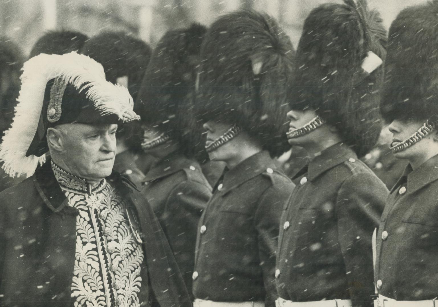 Lt gov Rowe inspecting guard after arrival at Queen's park