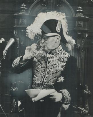 Reflex action: Just as he was describing Ontario's water shortage at Parliament's opening, Lieutenant-Governor Rowe reached for a glass of water