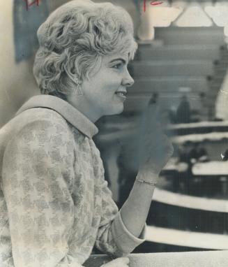 June Rowlands, a mother of five (including two sets of twins) looks down on council chamber at City Hall