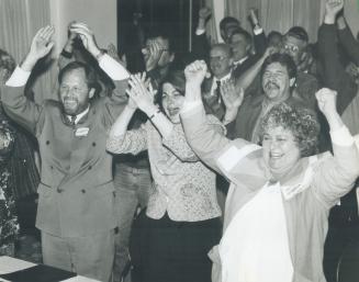 Talks over: Sid Ryan of Cupe, left, education worker representative Vanessa Kelly and teacher union head Liz Barkley join other unionists at the Royal York Hotel last night in a solidarity cheer