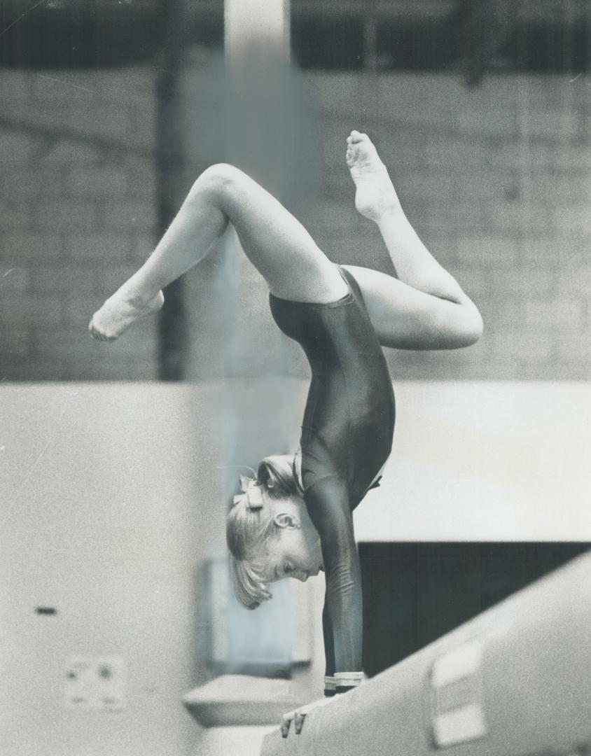 Perfect balance is the name of the game for Toronto gymnast Elfi Schlegel, 13, as she puts in one of her 4 1/2-hour practice sessions in the gym. Trai(...)