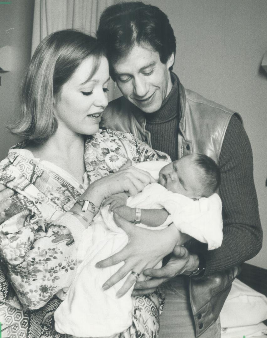 Ballet baby premieres. National Ballet principal dancer Tomas Schramek and his wife, Corps de Ballet dancer. Deborah Todd pose with their first child, baby girl Julia, 10 pounds, born last Friday