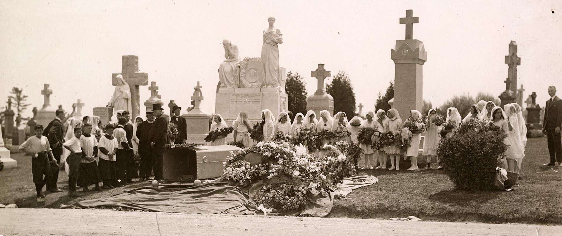 Funeral of Josephine (Maiorana) Puccini (Mrs. Abramo Puccini). Image shows a groups of people s…