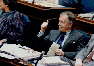 Keep cool: Attorney-General Ian Scott gestures after telling the Legislature yesterday it is in the interests of everybody to let the trial of David Deviney take place in a normal fashion