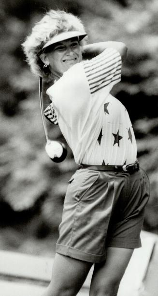 Fine form: Nancy Scranton, Illinois tour sophomore who blistered the Board of Trade course yesterday with a 64, displays the driving form that shot her into the du Maurier lead