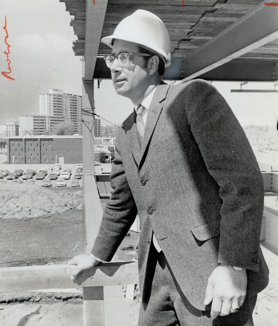 Hard Hat worn by Mayor Jim Service symbolizes what's happening in North York