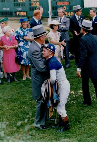 Whew, That was close! Kinghave's Bud Willmot and jockey Don Seymour finally were able to relax in the winner's enclosure after one of the most exciting Plate finishes ever