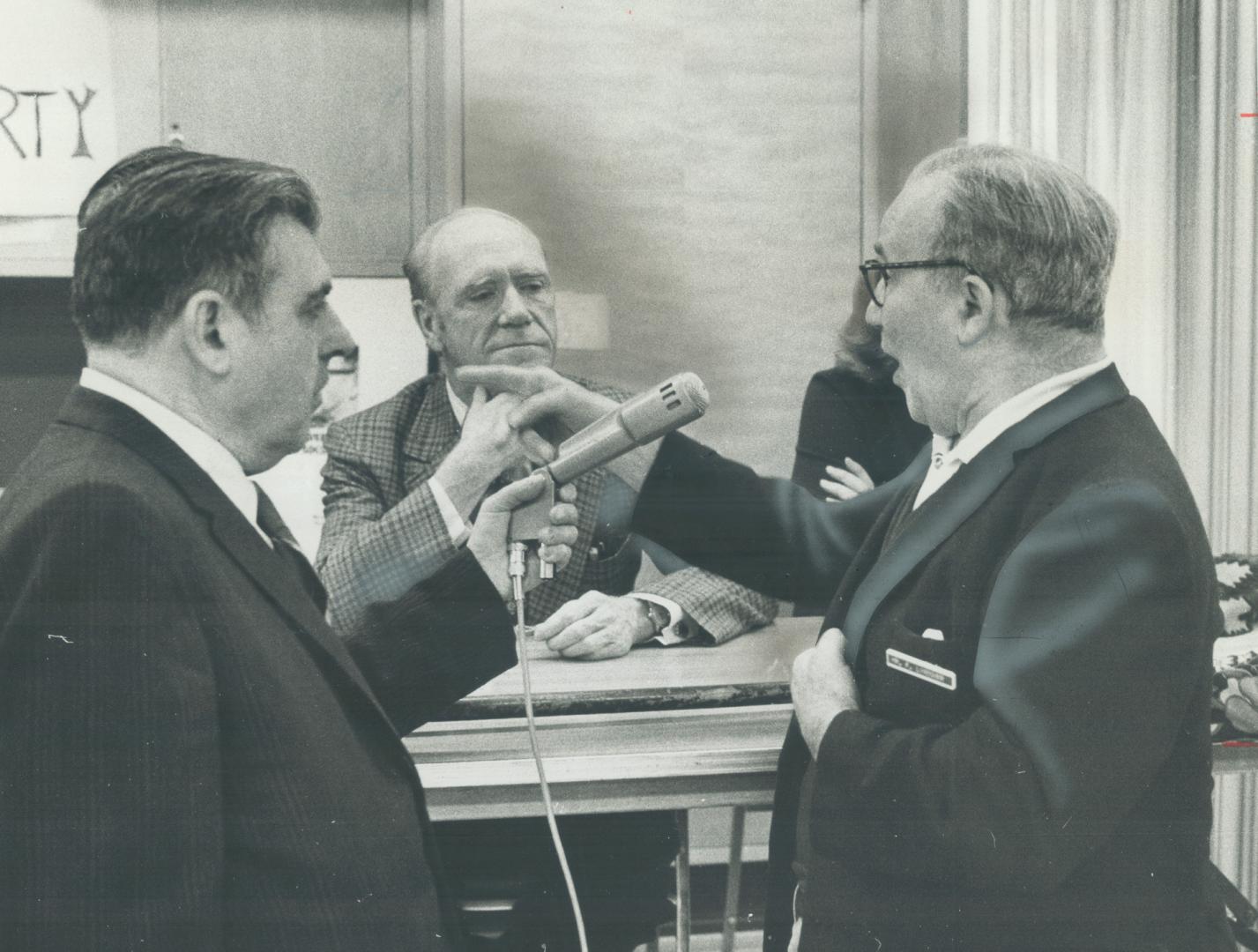 External affairs Minister Mitchell Sharp, who is running for re-election in Eglinton, listens to a question from 66-year-old Frank Lindover, a patient(...)