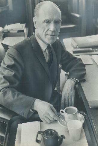 Mitchell Sharp takes a pot of tea in the parliamentary restaurant, where he was found dining on baked halibut steak