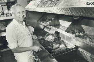 Fish 'n chips defy trend, Ron Bruce: Hand-cuts up to 150 pounds of potatoes a day, Ron Bruce is one of a vanishing breed, the English fish 'n chips man.