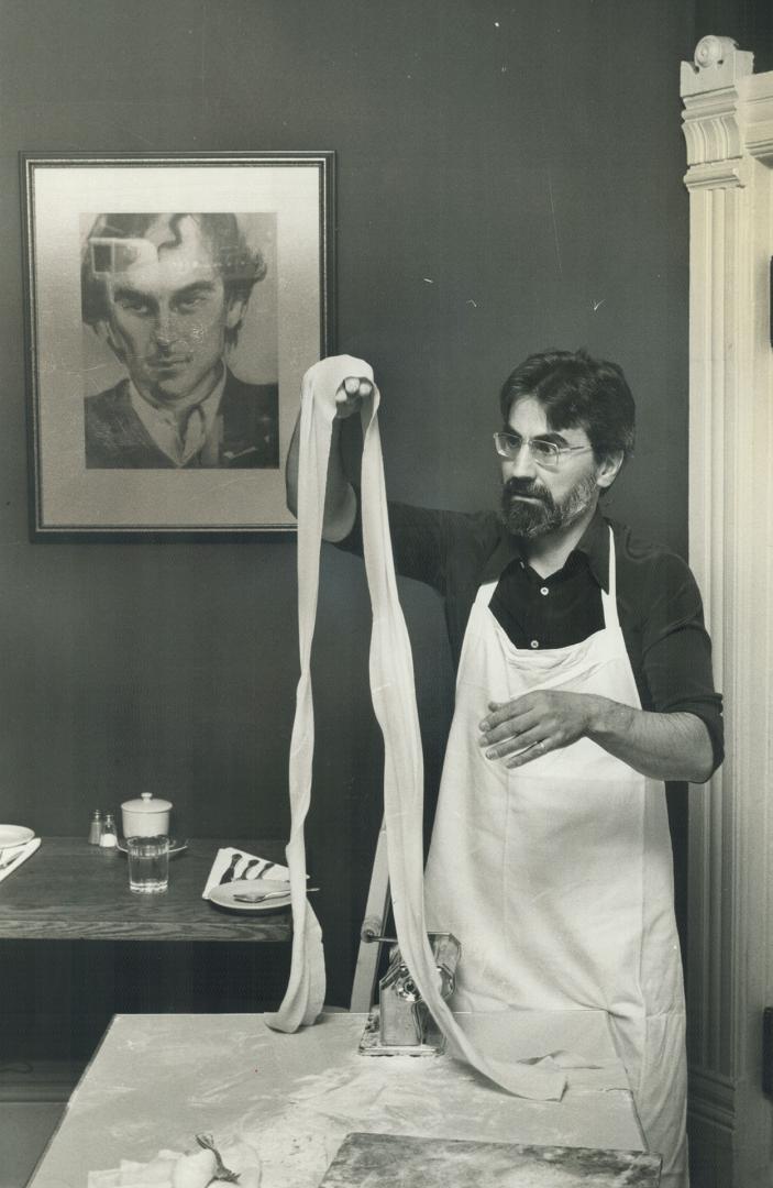 Pasta perfectionist: Philosopher Giuliano Bugialli shows how pasta should be twirled.