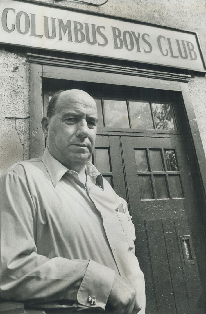 Carmen Bush stands in front of Columbus Boys Club, a Toronto institution he's been connected with for 40 years. Tonight, Carmen is being honored with a testimonial dinner for his years of dedicated work with Toronto youngsters.