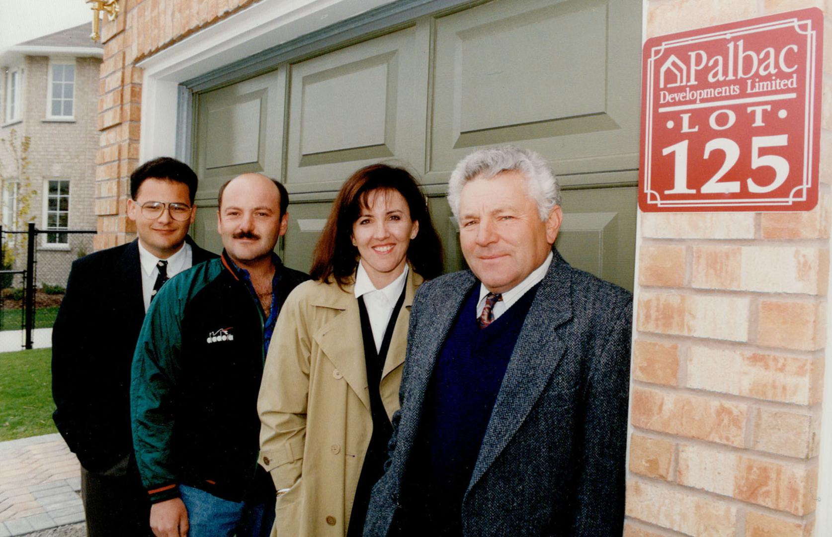 Home Team: Ralph Baccilieri, right, with sons Ben and Frank and Silvana Palombo of the Metro area home-building firm of Palbac Developments.