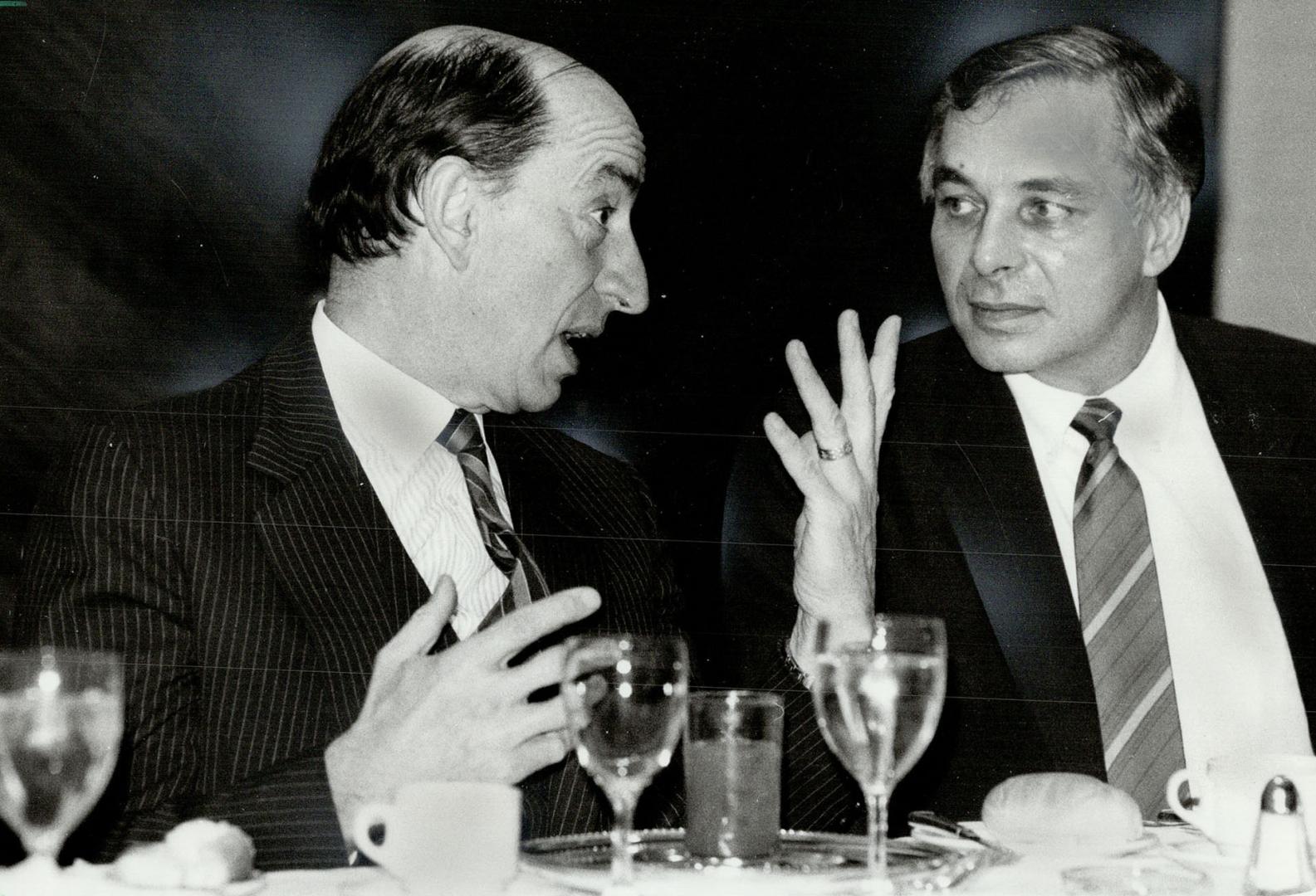 No problem: Finance Minister Marc Lalonde gestures as he speaks to Steve Bochen, chairman of the Profit Sharing Council of Canada, at a dinner last night in Toronto.