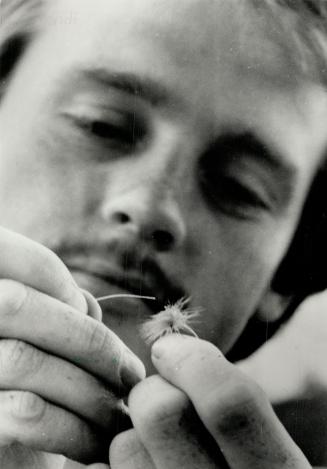 Tying A Fly: Harvey Beck, 25, of Scarborough is Canada's casting champion.