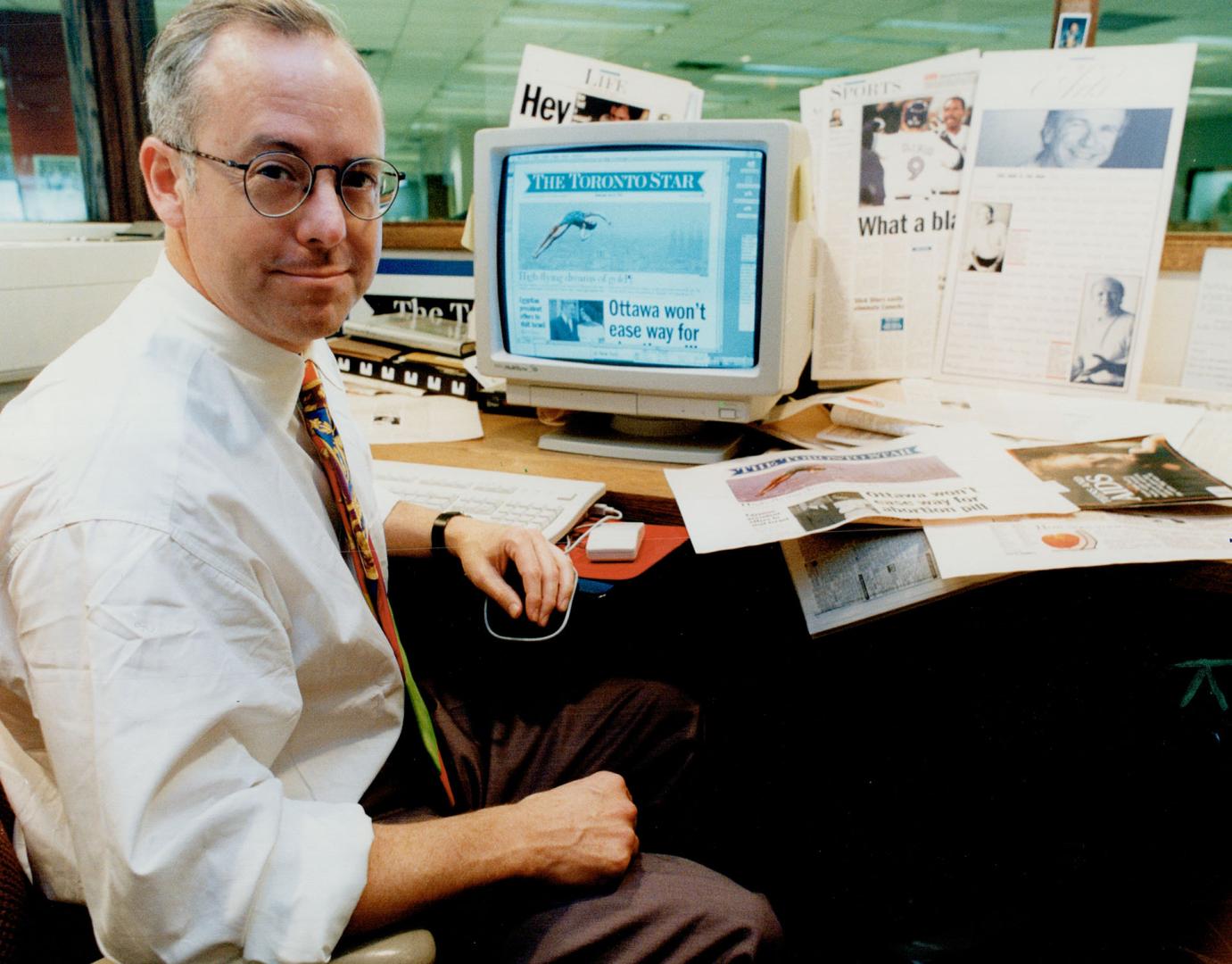 Black at work: Roger Black, a consultant who has offices in New York, Milan and Mexico on the job during one of his visits with the redesign team at The Star.