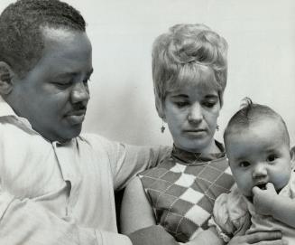 Racial Discrimination kept their child Pamela from being baptized, according to Fred and Joyce Borden. Rev. Norman Thomas of Wood Green United Church, says he refused to perform ceremony for theological reasons.