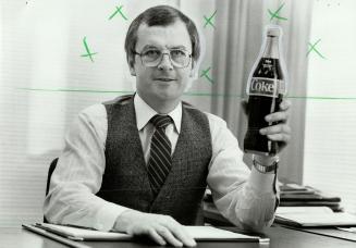 Coporate warriors: Rod Malcolm (left) marketing director of Pepsi-Cola and John Brennan, vice-president of marketing for arch rival Coca-Cola, are bent on carving out a bigger share of the cola market for their respective products.