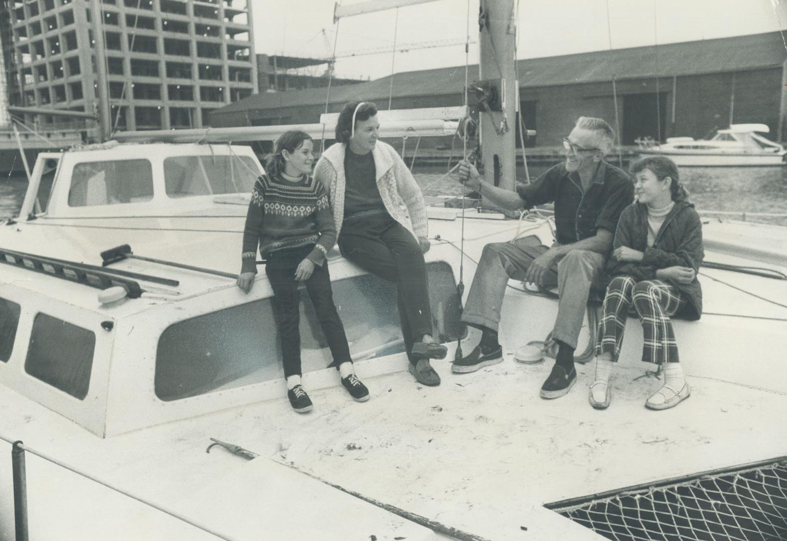 A dream come true for former Scarborough insurance man Frederick Carlisle is his three-hulled Caravel II. He bought it 5 years ago for $25,000 and has cruised more than 20,000 miles with his daughters Nora, 11 (left) and Mary, 13, (right) and his wife. During the five-year getaway on the world's oceans the girls managed to pick up six years' credits on their correspondence courses. The Carlisles are thinking of crossing the Atlantic Ocean a second time next year.