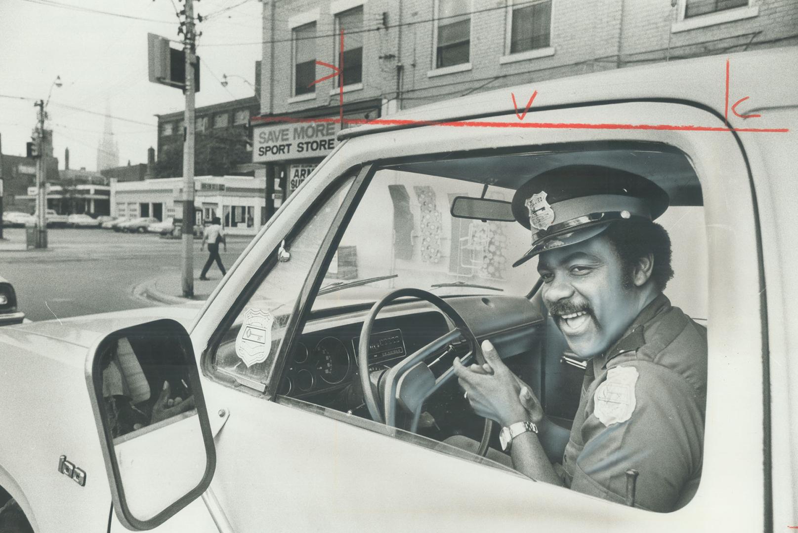 Startled motorists think be's outs when they bear security man Mark Carter sitting at a stoplight, singing and clicking his fingers, but most drive off with a smile. Mark, a 26-year-old native of Barbados, feels Metro people are much too glum and take life too seriously. You start singing, you feel better, he says.