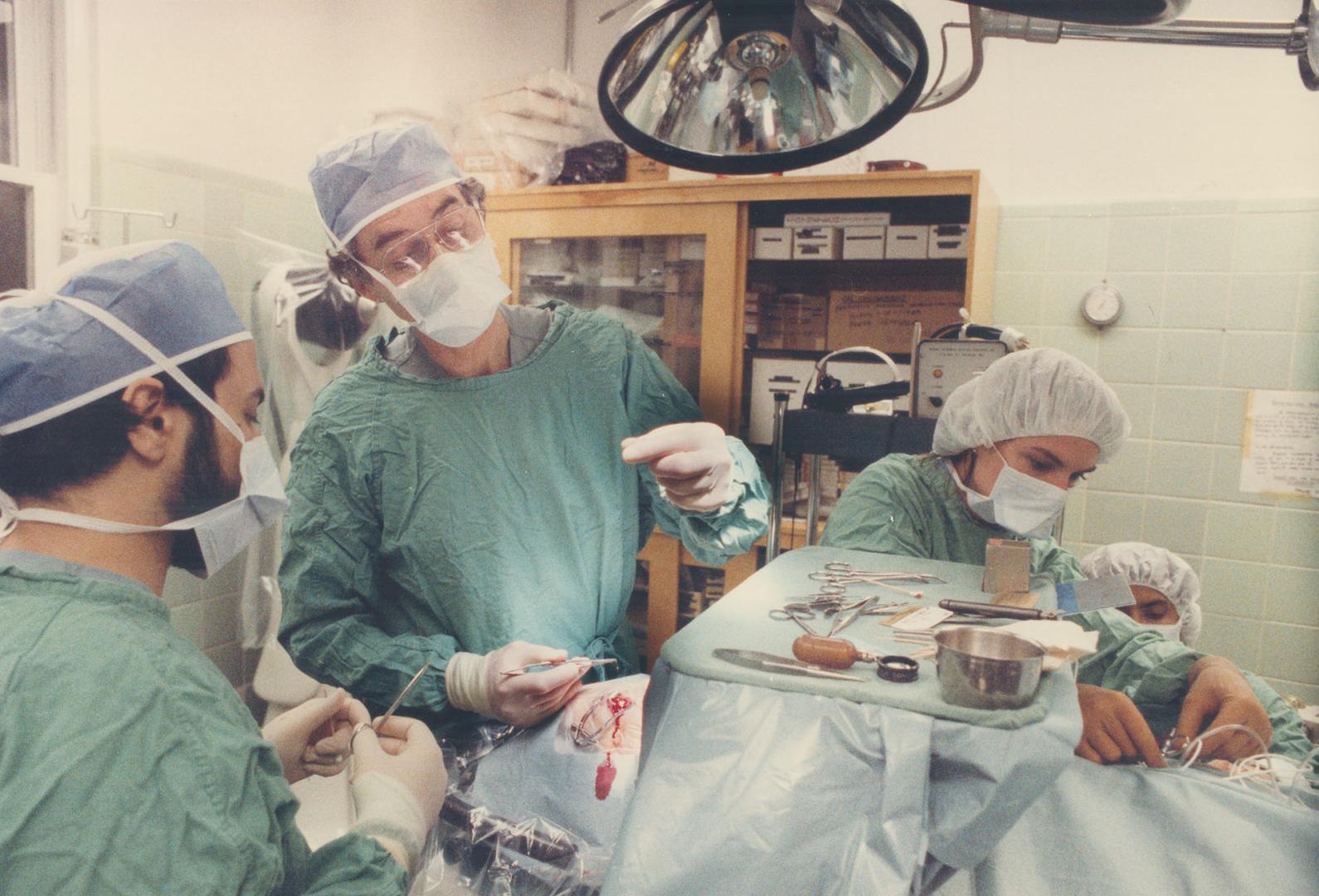 Eye operation: Eye surgeon Dr. Lionel Chisholm of Toronto Western Hospital says a research clinic here would provide a centre where he and other doctors could share information on eye treatment techniques with researchers. Because there is no eye research institute in Canada, those with disease or injures often travel to the U.S., the site of the nearest eye centres.