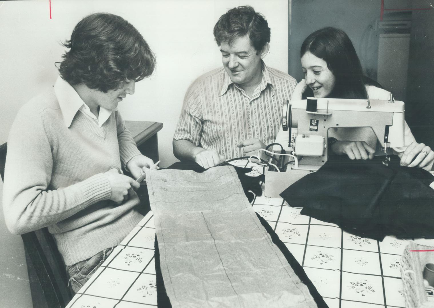 Teenagers like their parents to share their interests, Andrew Croll, the father of five, discovered when he asked youngsters to rate his performance as a parent. Taking the hint, he's watching son Peter, 16, and daughter Cynthia, 15, carry through a sewing project. Recently divorced, Croll is providing all parenting for the family.