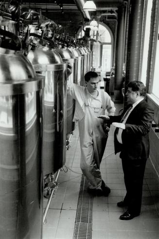 Brew master of the Rotterdam brew pub on John St., Joel Manning, owes his job to the entrepreneurial drive of Allan Calford, right, who designs, builds and installs brewing systems throughout North America.