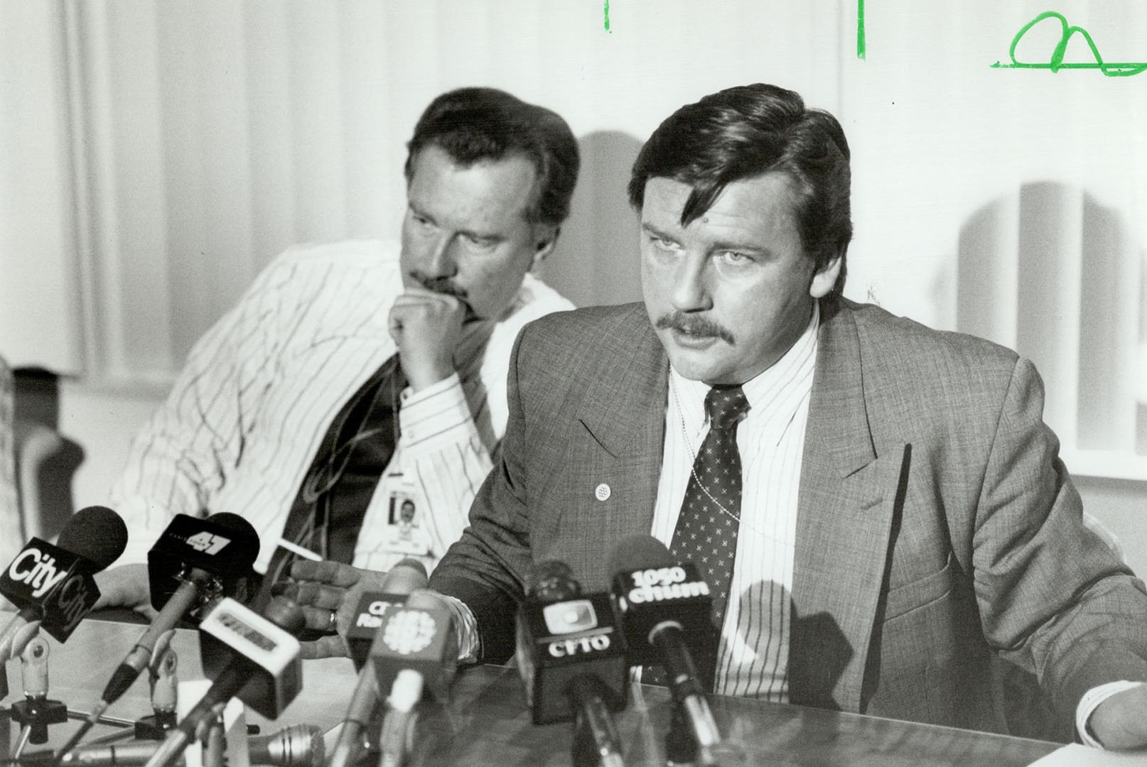 Proponents angry: Metro Councillor Scott Cavaller, right, with Chairman Alan Tonks, rails at the province yesterday for killing the market value assessment plan.