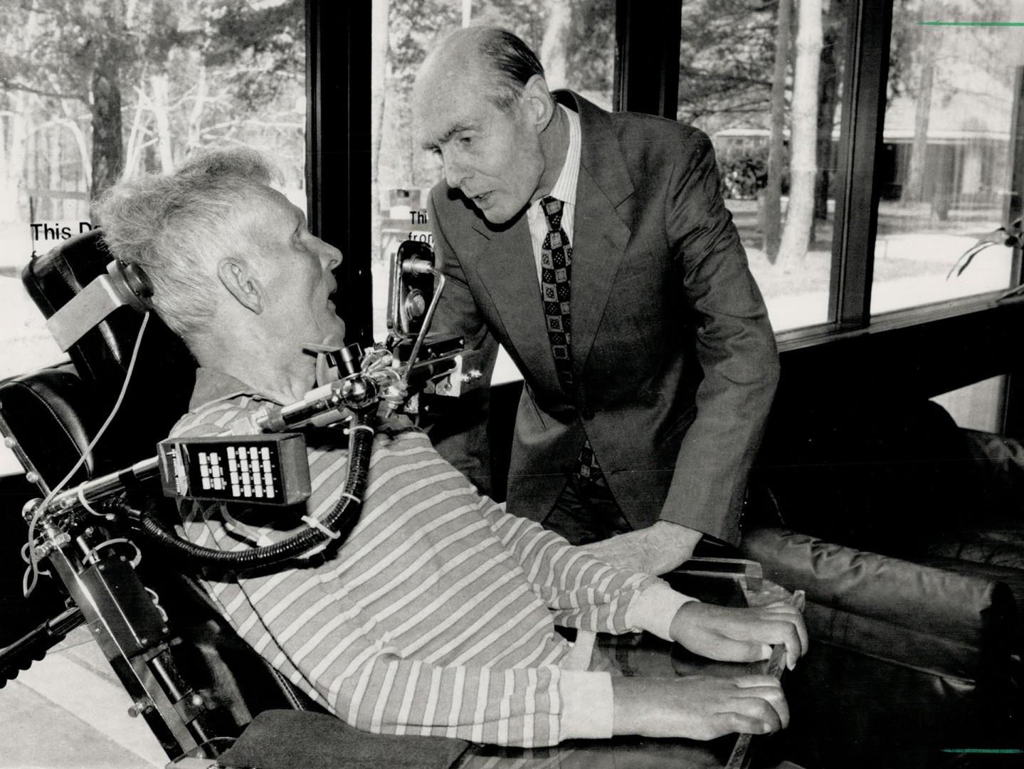 Airmen meet and remember. Group Capt. Leonard Cheshire, right, of the famed World War II Dambusters Squadron of the RAF visits with RCAF veteran Fred Brand in the veterans' wing of Sunnybrook Hospital yesterday. Cheshire, a Victoria Cross winner, has founded a World War Memorial Fund for Disaster Relief for which he hopes to raise $800 millions by Sept.3.