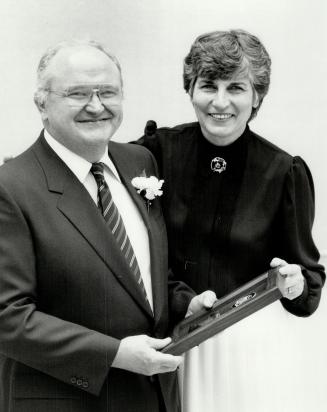 In top 10: Etobicoke recently held its first Volunteer of the Year Award ceremony and Richard W. Corbett, for Youth Without Shelter, was one of the 10 winners. He's shown with his wife Gail.