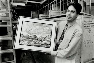 Gallery owner Frank Costin prepares Dry Scale for exhibit of impressive landscapes by David Alexander.