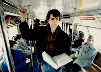 On the move: Student Joe Costa, 18, bones up on a course during his 45-minute bus trip to and from Bloor Collegiate every school day from the Dufferin-Wilson area. The quality of education of Bloor makes the travelling worthwhilek, he says. I'd rather not go to a technical school.