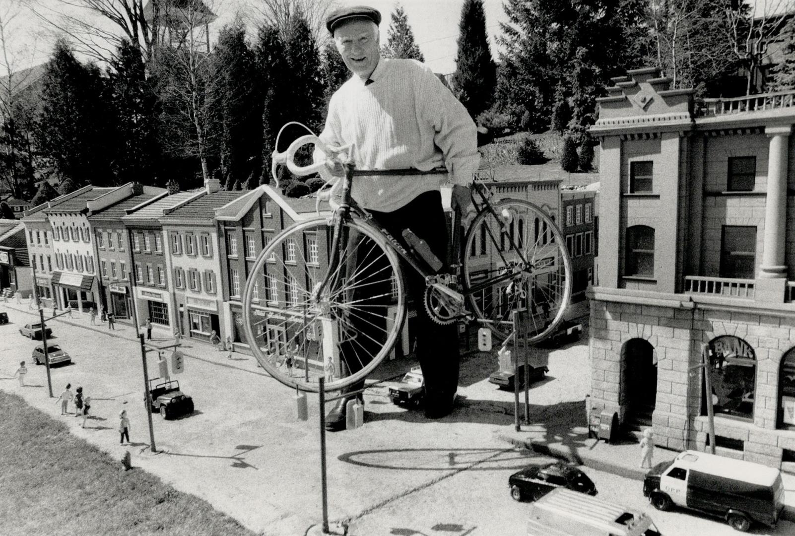 Rider with a cause: Len Cullen, owner Cullen Gardens and Miniature Village in Whitby, prepares for the 800-mile bicycle trip from Windsor to Quebec City that he and his wife, Connie, are making to raise money for Divinity College at Hamilton's McMaster University. They hope to raise $200,000.