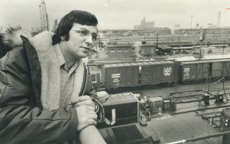 Looking over Toronto's railway yards, Sanford Duplassie, 25, left White River in June when CP Rail laid off workers. There's a future here, he says. Only one of his friends has remained in the north. There's nothing there for the younger person. There's no industry. There's nothing. Over half the town is made up of pnsioners. His father is one of them. Sanford's 11 brothers and sisters are scattered across North America, from Texas to British Columbia.