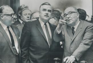 On first Canadian visit, Israeli Prime Minister Levi Eshkol (right) paid a courtesy call on Premier John Robarts (centre) and met Philip Givens, former mayor of Toronto, after arriving in the city yesterday. He planned to spend most of today observing Jewish Sabbath in his hotel room. After sundown he will be guest of honor at a dinner at Adath Israel Synagogue, then will leave tomorrow for Montreal where he will present Israel's Expo pavilion to the city.