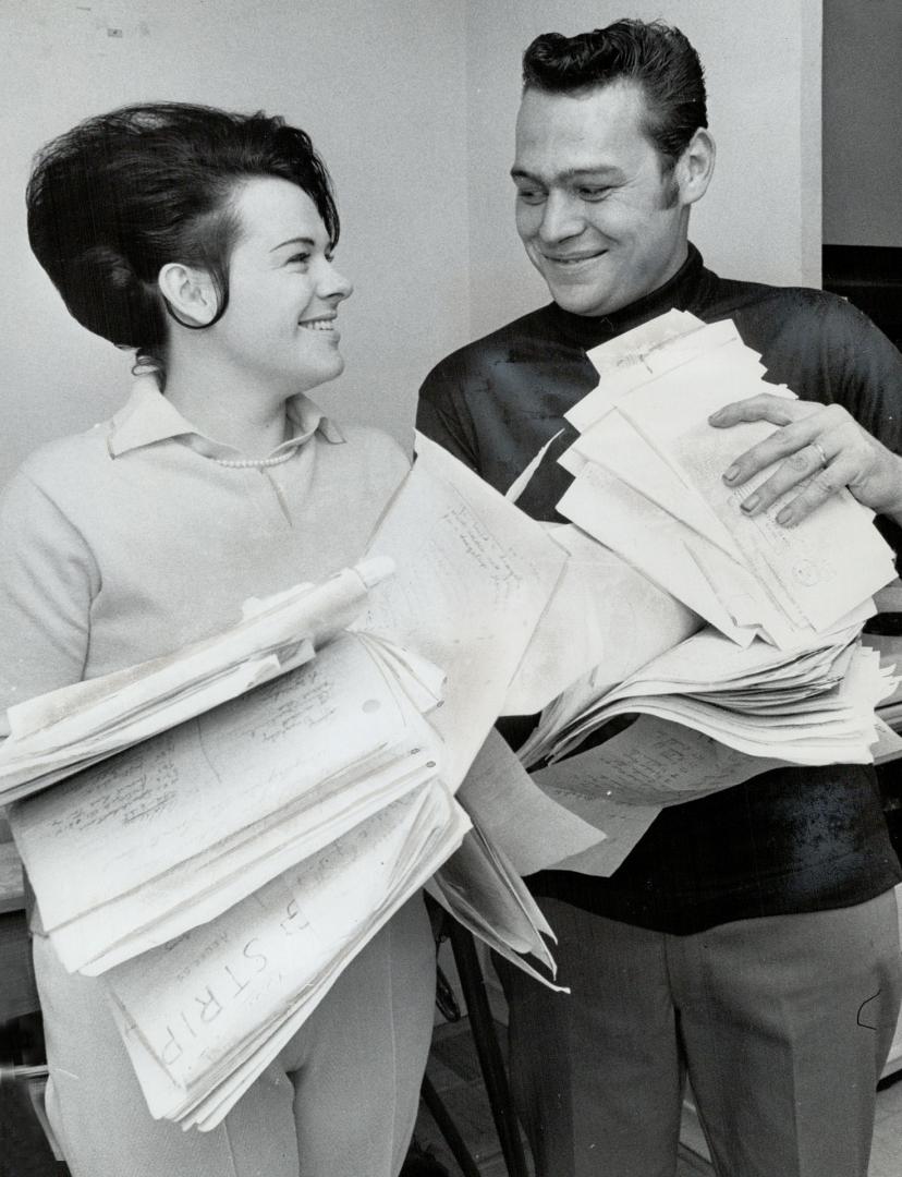 Mr. and Mrs. Thomas Dalton of Scarborough hold signed petitions they have collected asking for building of a drag strip in the Metro area so that young people will have a place to race their cars under proper supervision.