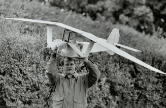 U of T professor James Delaurier prepares to launch the first flapping bird-machine in history that isn't a flop