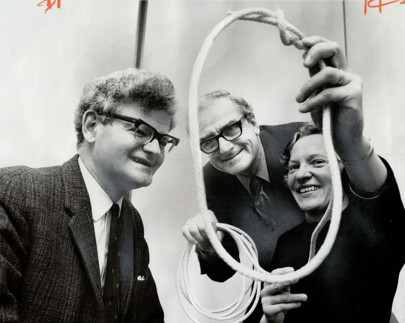 Sailor-businessman Frank Dye (left) knows the ropes when it comes to boats. He and his wife Margaret are in Toronto to talk about some of their adventures. At centre is Don Davis, Wayfarer Sailboat Association president.