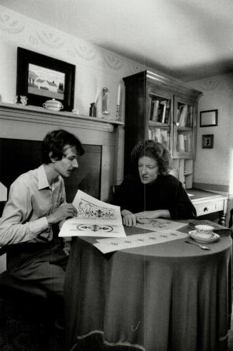 Stencilled motifs: Above, heritage planning consultant George Duncan and stenciller Kerry Gould examine traditional stencilling motifs.