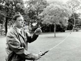 Master caster: Peter Edwards, executive director of the Toronto Sportsmen's Association in Etobicoke, demonstrates one of the techniques that has put the group among the best on the globe, with 18 world medals.