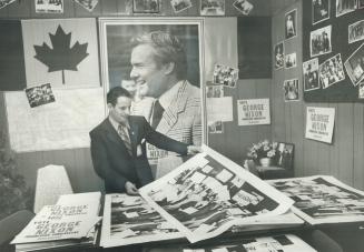 Organizer of Italian canvassers in the Dovercourt area in support of Conservative party candidate George Nixon. Joe Garisto, 38, looks over campaign posters in candidate's headquarters. Garisto, who runs a food-catering business, says many of Metro's 350,