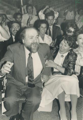 Nomination victory: A jubilant Emmanuel Feuerwerker celebrates his Liberal nomination win yesterday in Etobicoke Lakeshore, with his wife, Lise, at his side.