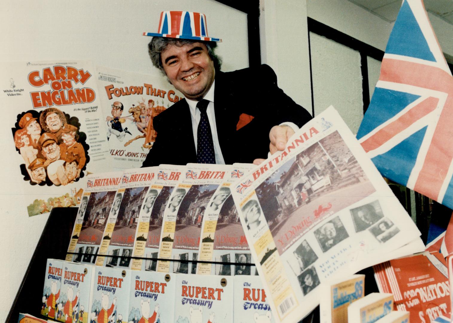 Memory maker: Terry Fletcher touches the hearts of British immigrants to Canada at his shop on Queen St. E. His monthly paper stresses the positive side of the news in Britain and will become a magazine in January.