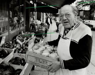 Long line-ups: Tony Fasolino, a Beach fruit seller, says he stood in line for 20 minutes the last time he went to his new bank branch.