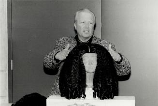 Elegant Egyptian: Toronto hairdresser Robert Gage with wig he created for the ROM of the type an Egyptian lady might have worn in 1400 B.C.